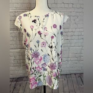Light blouse with floral decor